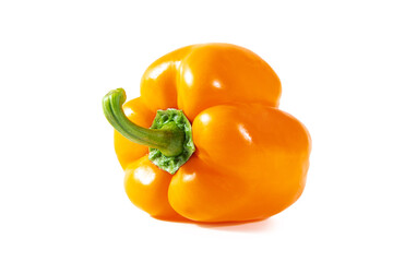 Fresh juicy shiny orange bell pepper isolated on white background.