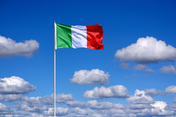 small soft cumulus fair weather clouds in a blue sky