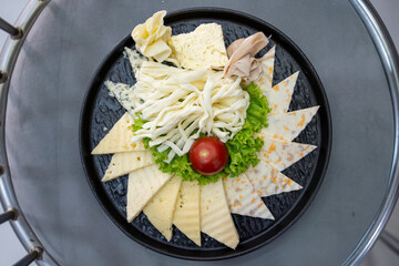 Cheese platter and cherry tomato