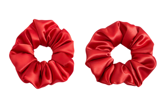 Two bright red scrunchies made from shiny satin fabric on transparent background - Powered by Adobe