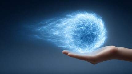 A hand holding a blue ball that is surrounded by a blue light