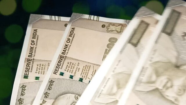 A person counts Indian 500 rupee currency bank note