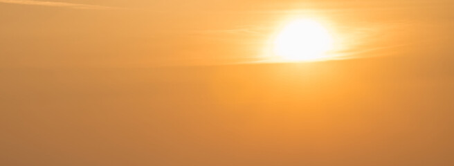 Sunrise in hazy clouds