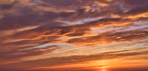 Firey orange clouds in sky