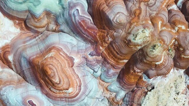 Cinematic aerial shot of abstract patterns of desert landscape in Hanksville, Utah, USA