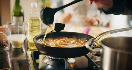 Cooking, food and pan with person in kitchen of restaurant closeup for diet, health or nutrition. Gas stove, ingredients and recipe with chef in hotel for gourmet cuisine, hospitality or service