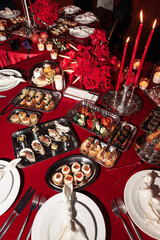 Assorted elegant canapés and hors d’oeuvres on metal trays, featuring seafood, vegetables, and savory pastries — perfect for upscale events.