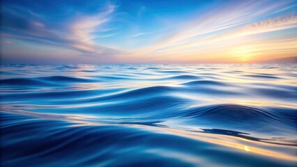 Obraz premium Serene Ocean Waves at Sunset A Captivating View of the Water's Surface