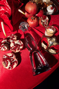 Luxury Table & Tequila Elegant festive table setting with premium tequila bottles, red accents, and gourmet treats. Ideal for upscale events and celebrations.