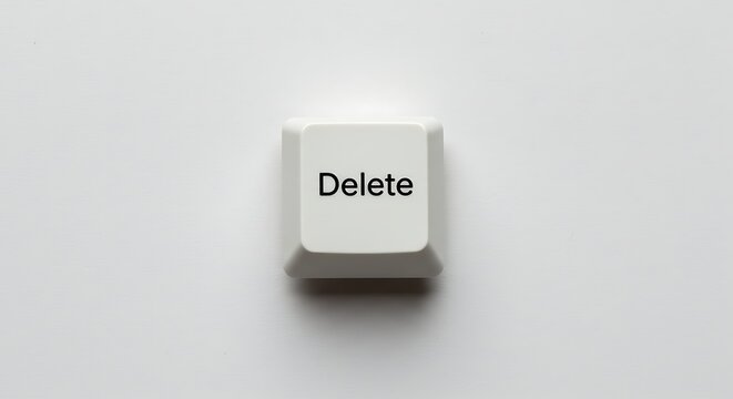 Close-up of a white delete key on a keyboard
