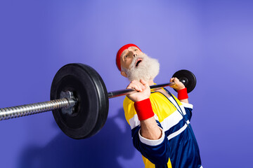 Senior man in retro sportswear lifting a barbell, embodying fitness and humor in a nostalgic...