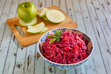 sautéed red cabbage with green apples and onion