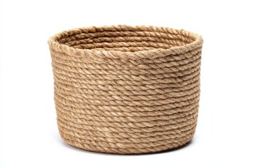 Obraz premium A sturdy, cylindrical basket woven from thick, natural-toned rope. The neutral color palette makes it versatile for any home decor style.