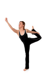 Fototapeta premium Dancer performing elegant pose during a studio session with a focus on balance and grace while showcasing athleticism and artistry