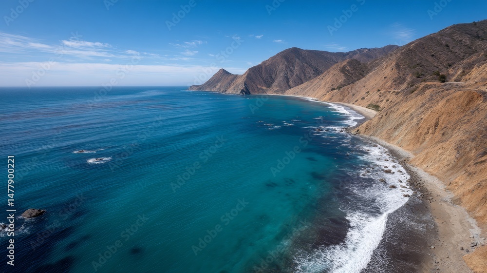 Poster Vibrant turquoise waters crash against rugged cliffs, capturing a serene coastal view with distant waves and a bright sky creating a peaceful atmosphere
