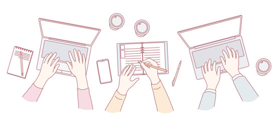 Aerial view of hands working on laptops and notebooks, perfect for productivity and teamwork themes.