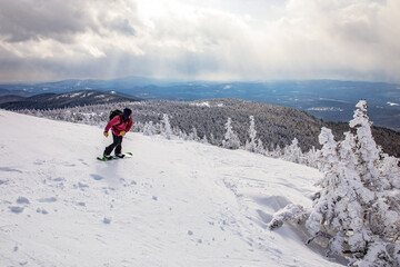 Snowboarder Carving Through Fresh Powder Snow