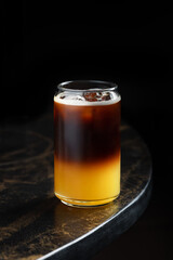 Espresso Orange Tonic – A bold mix of espresso layered over orange juice and tonic water, served with ice. Vibrant and refreshing with a citrus twist and a caffeine kick.