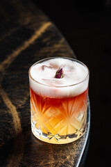 Rose Whiskey Sour – A floral twist on the classic whiskey sour, featuring smooth bourbon, citrus notes, and a rose foam crown.