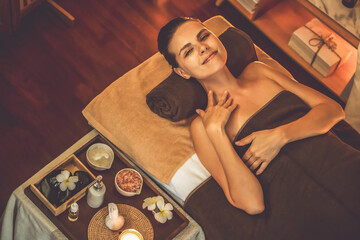 Caucasian woman customer enjoying relaxing anti-stress spa massage and pampering with beauty skin...