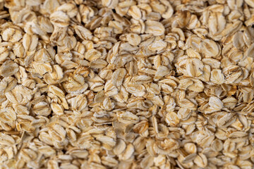 flakes from which porridges and other healthy dishes are prepared, flakes quick cooking of oat grain dishes, closeup