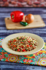 dirty rice with ground beef, bell pepper, onion, and garlic