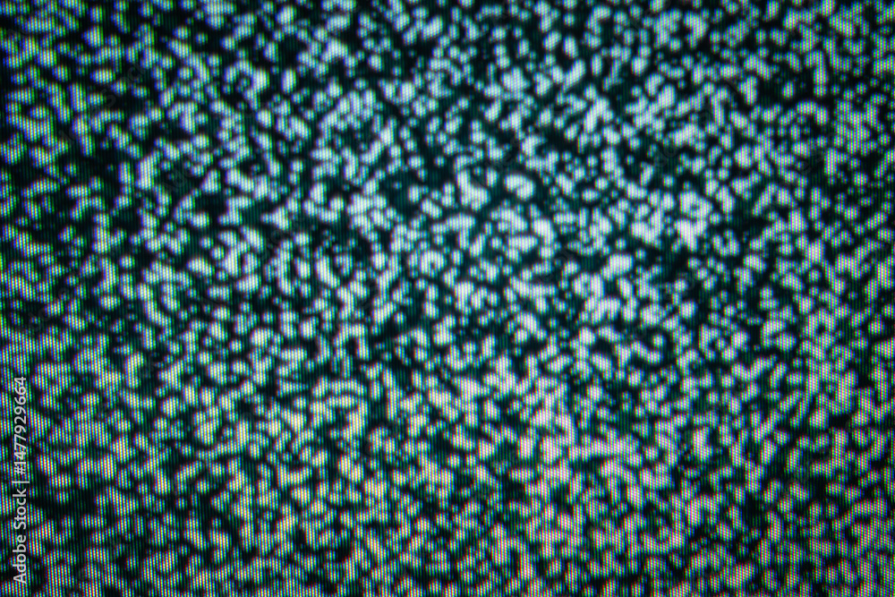 Poster pattern of static on old television screen displayed in close-up view