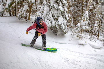 Snowboarder Carving Through Fresh Powder Snow