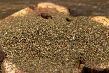 dried tea leaves, ground and crumbled into very small pieces with the addition of flavoring and aromatic additives