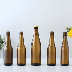 Amber glass bottles; various sizes; studio setting; white background; product photography for packaging