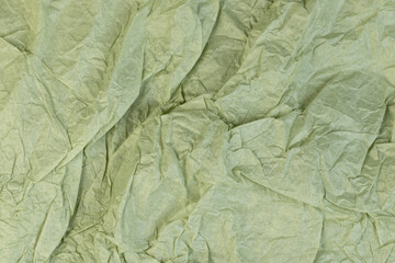 part of a sheet of paper crumpled after use