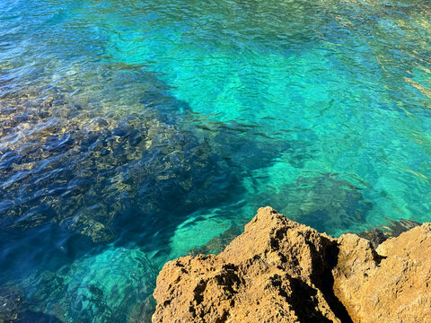 Sea blue turquoise water and rock.