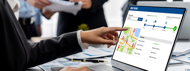 Business intelligence and data analysis concept. Analyst team working on financial data analysis dashboard on laptop screen as marketing indication for effective business strategic planning. Insight