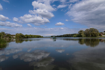 Landscape with lake and reflection in water.