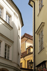 Charming european alleyway between historic buildings on a sunny day,Prague, May 3,2025