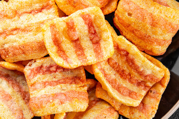 Chips bacon crispy rashers corn snacks fast food natural food fresh dish on the table rustic food top view copy space
