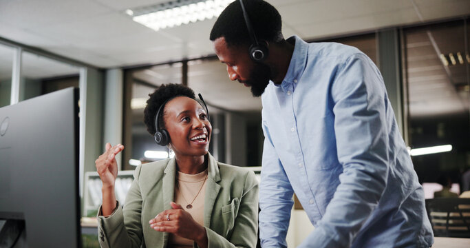 Call center, team and African people training with mentor for customer service, sales or crm at night. Smile, contact us and telemarketing manager on computer for discussion, help or teaching intern