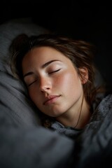 Woman sleeping in bed