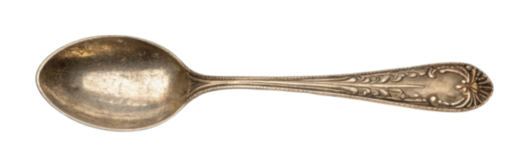 PNG Vintage ornate silver spoon with intricate design