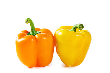 Fresh juicy shiny yellow and orange bell peppers.