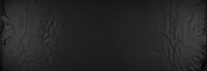 Fototapeta premium Creased black paper; worn, tattered edges, authentic vintage look , wrinkles, texture background