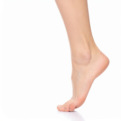 Woman showing her perfect smooth feet skin on white background