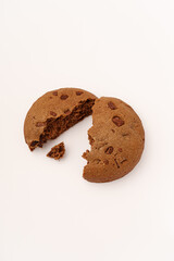 Half-eaten cookie with cracks on white background