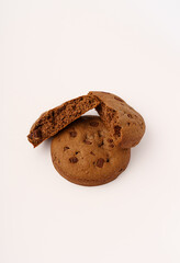 Half broken chocolate cookie on white background