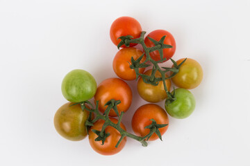 Yellow, Red, and Green Tomatoes on White Background