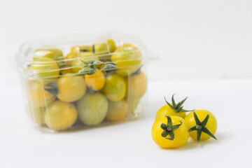 Yellow Cherry Tomatoes on White Background