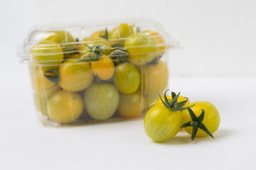 Yellow Cherry Tomatoes on White Background