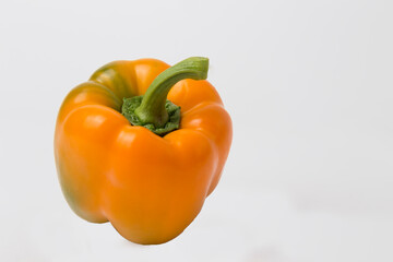 Orange Bell Peppers on White Background