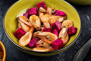 Shrimp cooked in a fruit marinade.