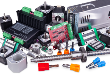 Various CNC machine components for prototype machine construction. Hardware like stepper motor driver control boards end mill linear rails isolated white background